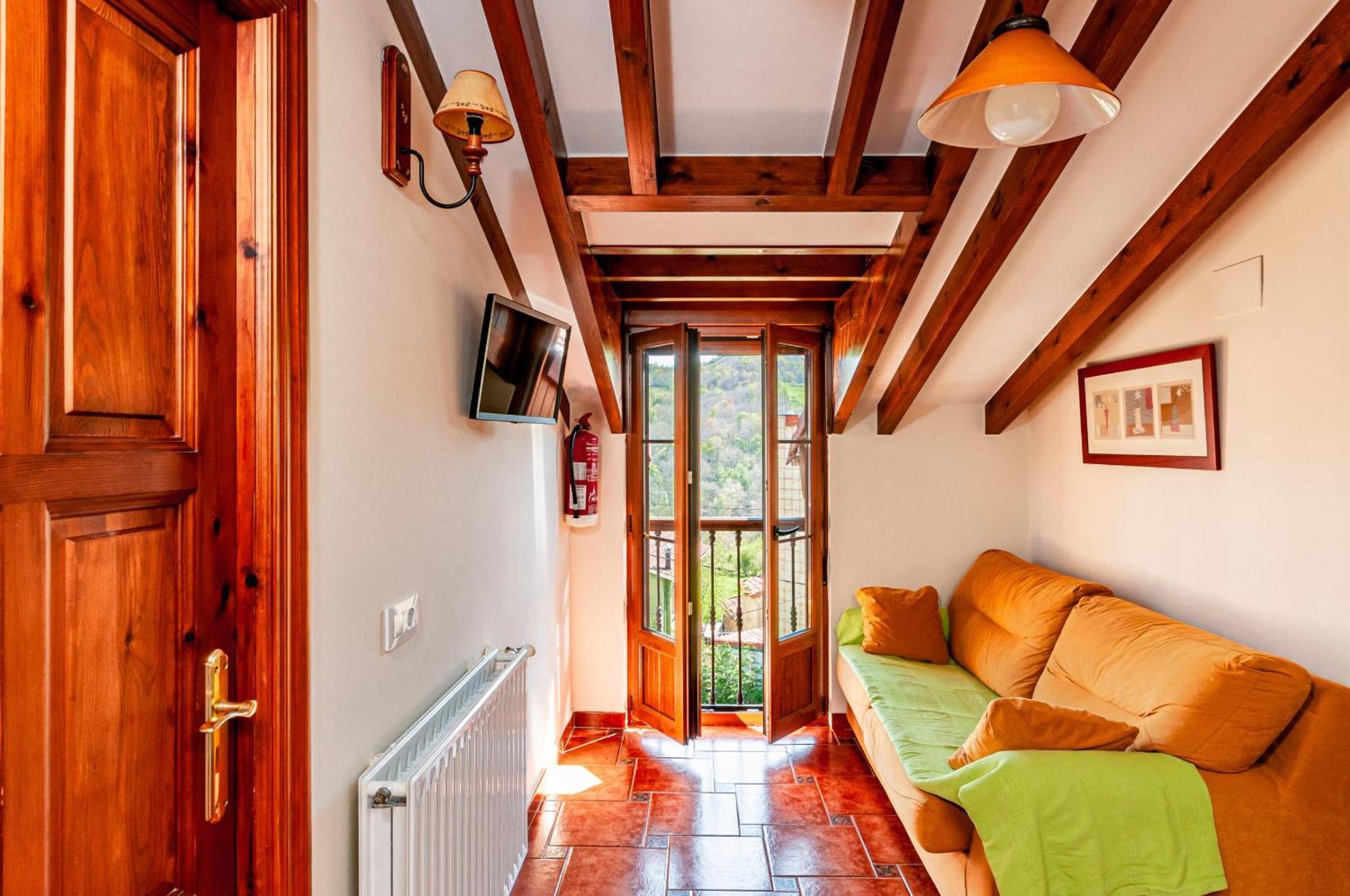 Apartamentos La Regoria อาเรนัส เด กาบราเลส ภายนอก รูปภาพ