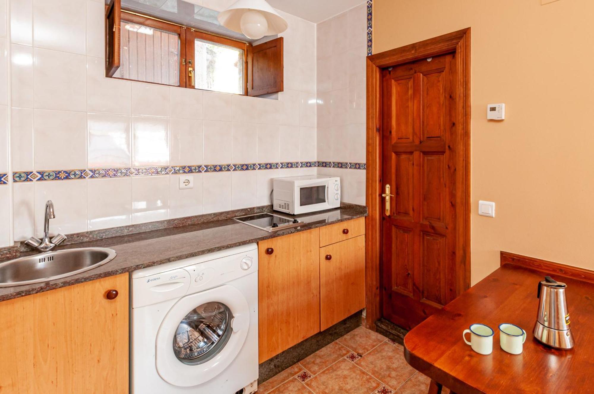 Apartamentos La Regoria อาเรนัส เด กาบราเลส ภายนอก รูปภาพ