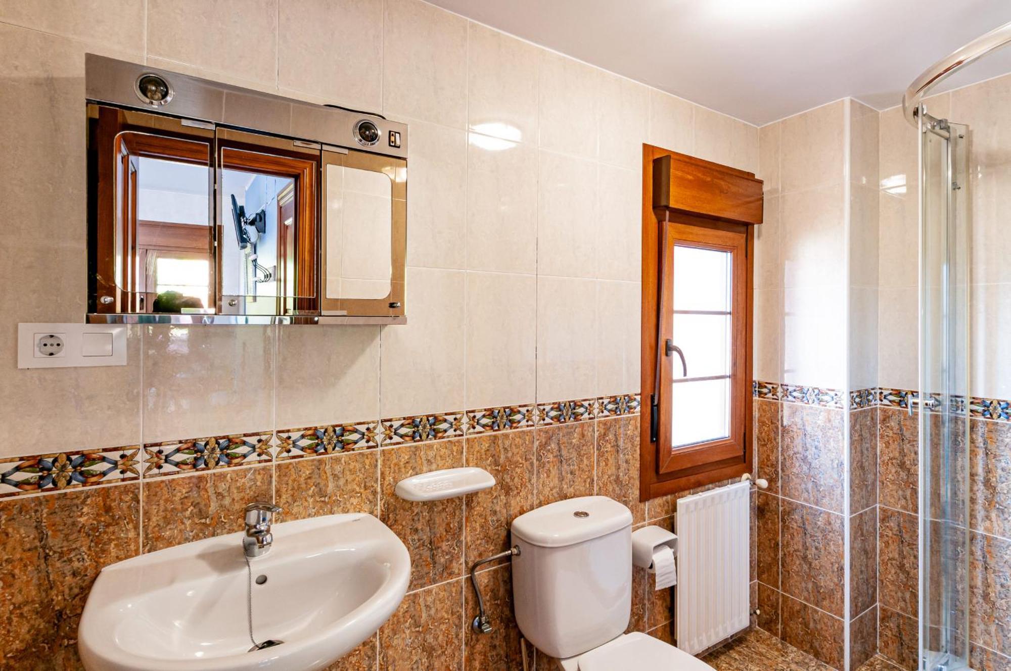 Apartamentos La Regoria อาเรนัส เด กาบราเลส ภายนอก รูปภาพ